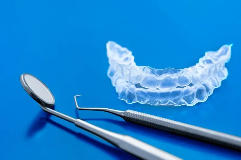 Zakończenie leczenia nakładkami Invisalign